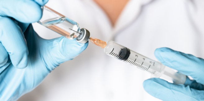 vaccine vial and syringe wiht needle